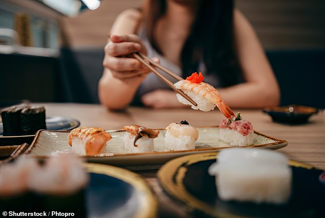 Sushi is a popular go-to for a 'healthy' meal, but it's not always as balanced as it seems (stock image)