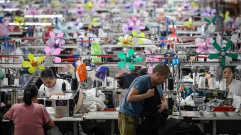 Workers producing garments at a textile factory that supplies clothes to fast fashion e-commerce company Shein in Guangzhou