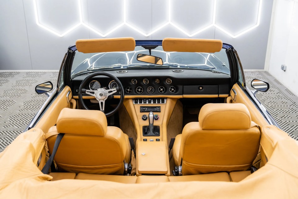 The interior of the car with its roof lowered