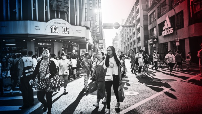 Pedestrians in the Wanhua shopping area of Taipei, Taiwan.  Unlike Trump, President Joe Biden promised that the US would defend the self-governing island in the event of an invasion 