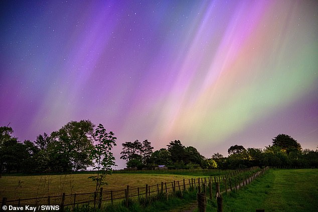 Here in the UK, the Northern Lights could be visible across Scotland, Northern Ireland, and parts of northern England. Pictured: Aurora over Lancashire in May