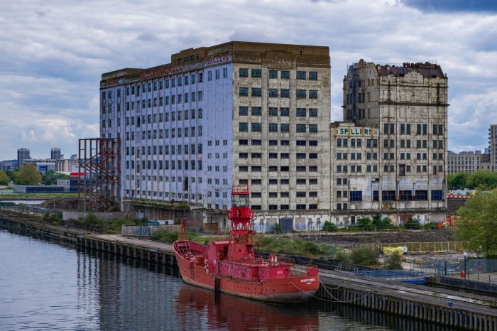 The abandoned Spillers Millennium Mills (flour mill) viewed from Pontoon Dock DLR station, East London