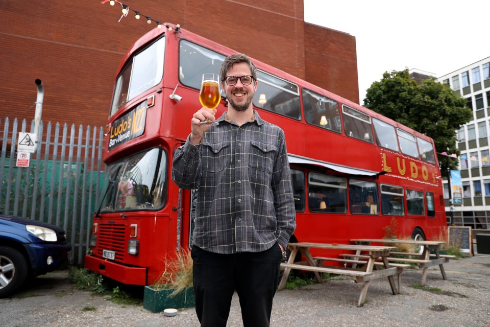 James in front of the pub, Ludo's