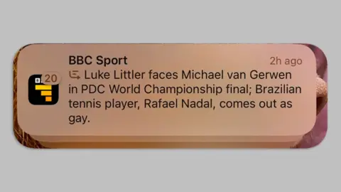 Screenshot of iPhone notification that falsely reports: "Luke Littler faces Michael van Gerwen in PDC World Championship final; Brazilian tennis player, Rafael Nadal, comes out as gay."